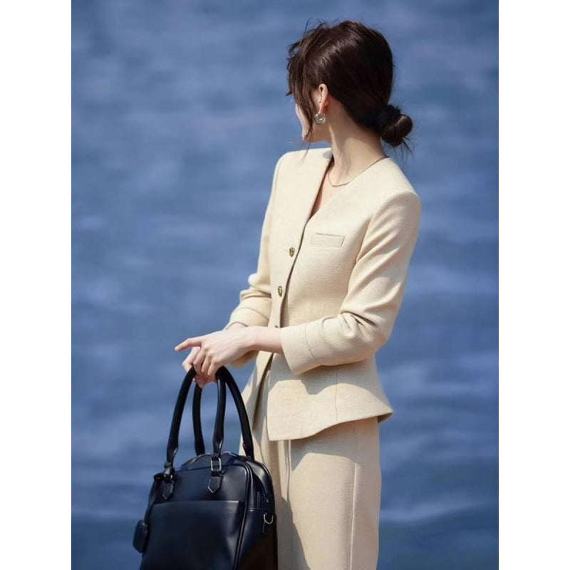 Waist-Grabbing Beige Coat and Wide Leg Pants Set
