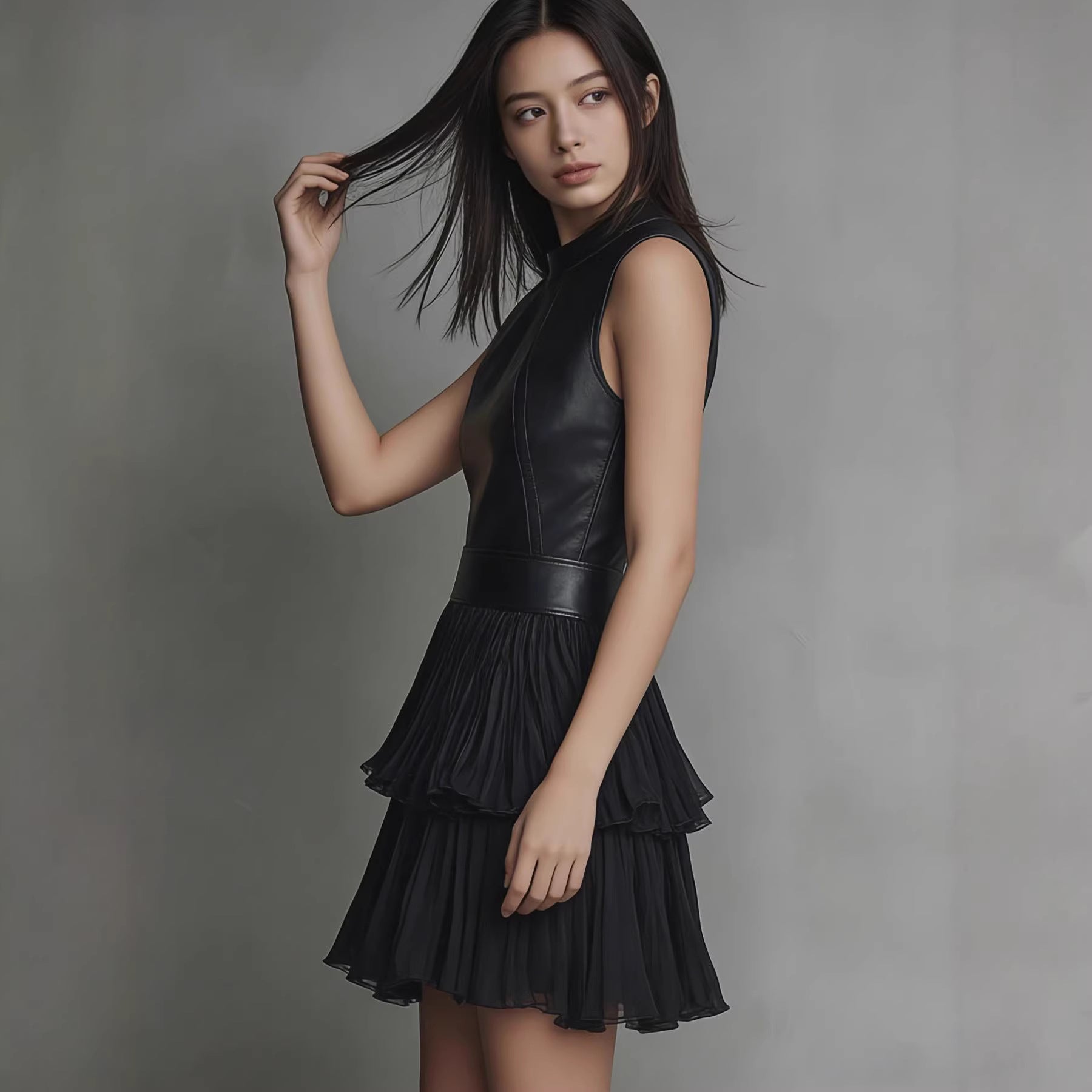 Black PU Leather Spliced Mini Dress – Sleeveless Double-Layer Ruffle Hem